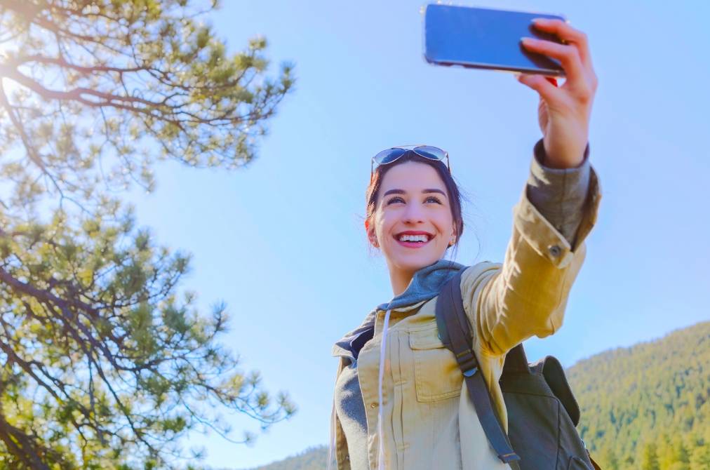 Lady taking a selfie outdoors